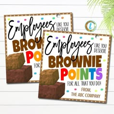 two brownie poo points for employees to use on the front and back of their business cards