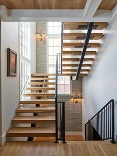 the stairs are made of wood and metal