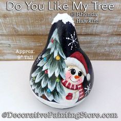 a painted christmas bell with a snowman and pine tree on it, says do you like my tree?