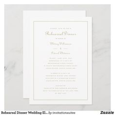 a white and gold wedding card on a marble surface