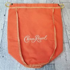 "Approx. 9inx7in gently used orange \"Peach\" Crown Royal bags. Great for crafting, sewing, and storage of dice, jewelry, make-up, and for travel. Please message me If you would like a specific amount of bags not listed. I can create a special order. Please check out our other Crown Royal listings - We have cat toys and eye masks. ** Please Note** Woven Adventure is in no way affiliated with any college, sports team, company or organization.**" Vintage Orange Bag For Gift, Vintage Orange Bag As Gift, Peach Crown Royal, Crown Royal Peach, Orange Crown, Dice Jewelry, Crown Royal Bags, Crafts Storage, Eye Masks