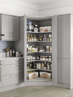 an open pantry with lots of food in it