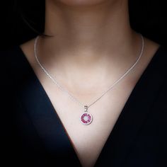 This stunning and classy Halo Pendant Necklace is crafted with 925 Sterling Silver Metal for a shiny look, and embellished with Tapered Baguette Shape Lab Grown Ruby set in invisible setting and more Round Simulated Diamonds studded as Halo. Elevate your everyday or party attire, by donning this Lab Grown Ruby Pendant Necklace. This Pendant Necklace is a perfect gift for your special ones. SKU : ENPE-122310106-SS-C Ruby Pendant Necklace, Ruby Set, Ruby Necklace Pendant, Halo Necklace, Party Attire, Ruby Pendant, Halo Pendant, Everyday Necklace, July Birthstone