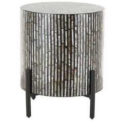 a white and black side table with metal accents