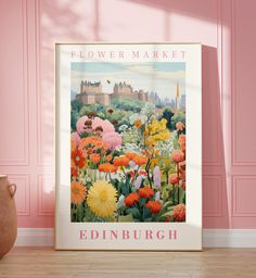 a pink room with a large flower market poster on the wall next to a vase