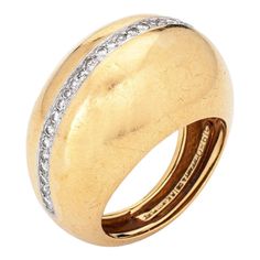 Rare vintage Tiffany & Co diamond dome ring designed by Paloma Picasso, crafted in 18 karat yellow gold & platinum (circa 1980).    33 round brilliant & single cut diamonds total an estimated 0.33 carats (estimated at G-H colour and VS2-SI1 clarity).  Dating to 1980 the 18k gold dome ring, with a central strand of diamonds, is designed by Paloma Picasso for Tiffany & Co, the same year she started her design work at Tiffany (and continues today). Paloma Picasso has a love of big gemstones and bol Tiffany And Co Bracelet, Vintage Tiffany, Bracelet Love, Paloma Picasso, Bold Jewelry, Dome Ring, Tiffany And Co, Domed Ring, Gold Platinum