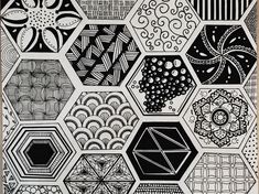 an art work with black and white designs on the back of hexagonals