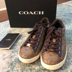 Authentic Coach Snikers Shoes New (Never Worn) Size 7.5 Coach Round Toe Sneakers For Sports, Coach Low-top Sneakers With Rubber Sole, Coach Sneakers With Laces For Sports, Coach Lace-up Sports Sneakers, Coach Lace-up Sneakers, Coach Lace-up Sneakers With Cushioned Footbed, Coach High-top Sneakers With Rubber Sole, Coach Sporty Lace-up Sneakers, Sporty Lace-up Coach Sneakers