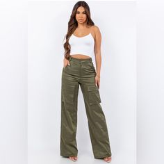 Bijou Cargo Pant In Green Waist 15” Inseam 29” 63% Polyester 35% Cotton 2% Spandex Summer Pants With Pockets In Elastane, Mid-rise Stretch Cargo Pants, Stretch Mid-rise Cargo Pants, Green Mid-rise Stretch Cargo Pants, Green Stretch Mid-rise Cargo Pants, Mid-rise Stretch Green Cargo Pants, High-waist Elastane Pants With Side Pockets, Green Mid-rise Elastane Bottoms, Versatile Fitted Cargo Pants