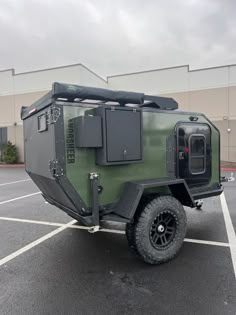 an off road utility vehicle parked in a parking lot