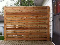 a wooden fence is shown on the deck