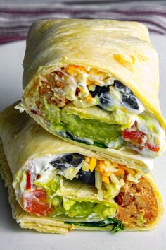 two burritos stacked on top of each other