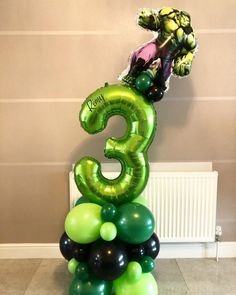 the number three is made out of balloons