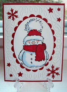 a card with a snowman on it