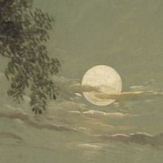 a full moon is seen through the water