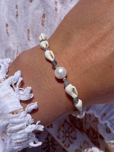 Seashell, Fresh Water Pearl and Fluorite Bracelet ~* Bracelet *~ Bracelet Design: Pearl in the Center, Seashell, Fluorite Pattern All Over Ending: Sterling Silver, Sterling Silver Clasp Gemstone Sizes: Fresh Water Pearl 8-10mm Seashell 7-9mm Fluorite 4mm Very Delicate and Lightweight Seashell, Fresh Water Pearland Fluorite  Bracelet Made to Order According Your Desired Size  *Please Reach Me If You Need Custom Size Not Listed in the Selection *Please Reach Me If You Want Matching Bracelets for Y Bohemian Shell Bracelets With Oyster Detailing, Shell Oyster Bracelet As Gift, Beaded Shell Bracelets As Gifts, Beaded Shell Bracelet As Gift, White Natural Stones Bracelets For The Beach, White Natural Stones Bracelets For Beach, Shell Strand Bracelets As Gift, Ocean-inspired Shell Strand Bracelets, Ocean-inspired Shell Strand Bracelet