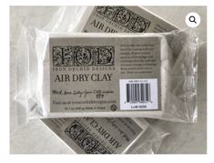 soap bar wrapped in plastic on top of each other with an air dry clay label