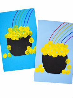 two cards with yellow buttons on them, one has a pot of gold coins and the other has a blue background