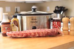 the ingredients are on the counter ready to be put into the crock pot and cook