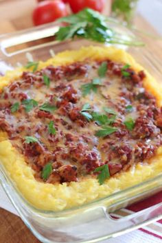 a casserole dish with meat and cheese