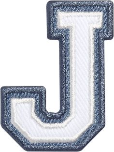 the letter j is made out of denim fabric and has an embroidered design on it