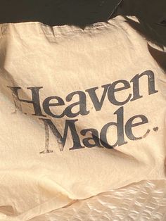 a bag with the words heaven made printed on it