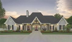 this is an image of a french farmhouse style home with front porch and covered patio