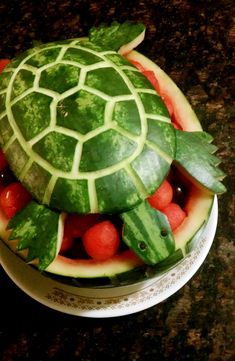 a turtle made out of watermelon and other fruits