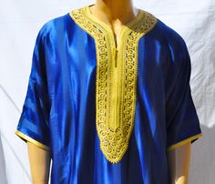 Moroccan kAFTAN for men, oriental kaftan, All sizes are Available Beautiful Moroccan kaftan in cotton for men. This Moroccan clothing is handmade in soft fabric cotton. This kaftan is very pleasant to wear mainly in summer, at the beach, after a spa, indoor, outdoor, at a party... Very fast to wear, not stick to the skin, this kaftan is a really must have clothing. - Cotton - embroidery - Machine washing return policy I check myself each product and sell only the best quality products in any case ; if you are not satisfied with the product . first; please contact me and i will do everything to your satisfaction. In any case you have a 100% Guarantee and refund. within 14 days in its original packaging and an condition the item is its original condition as received. buyer pay shipping and a Traditional Short Sleeve Kaftan For Festive Occasions, Traditional Short Sleeve Kaftan, Traditional Short Sleeve Kaftan For Ceremonies, Traditional Blue Thobe For Eid, Traditional Tunic Kaftan For Diwali, Traditional Long Kaftan For Diwali, Traditional Festival Thobe With Dabka Embroidery, Traditional Tunic Kaftan For Eid, Traditional Short Sleeve Kaftan For Eid