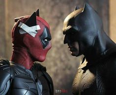 two men dressed as batman and catwoman are facing each other with the caption paul star