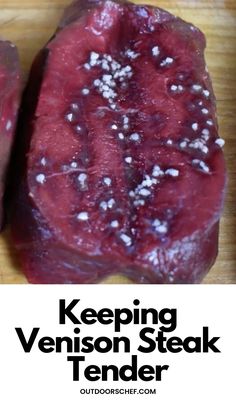 two steaks sitting on top of a wooden cutting board with the words keeping venison steak tender