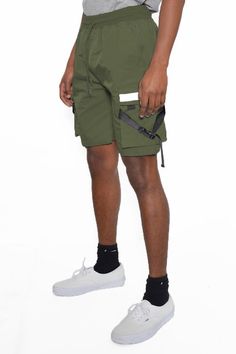 Tactical Short 98% polyester 2% spanReflective Tape Extra pockets sized for tactical use Utility Nylon Shorts For Streetwear, Techwear Cargo Shorts With Pockets For Hiking, Techwear Cargo Shorts For Hiking, Khaki Techwear Shorts For Streetwear, Green Cargo Sports Shorts, Techwear Cargo Shorts, Functional Cargo Shorts With Side Pockets For Sports, Functional Nylon Shorts For Streetwear, Sports Cargo Shorts With Cargo Pockets