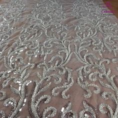 Price: The price is for 1 yard. if you buy more than 1 yard ,it won't be cut. will come in one piece the longest is 20 yards. Material: polyester,pearls,sequins,beads Fixed Wide : 110cm or 43 inches. color:off white,silver Want to see other colors and more similar Beading lace fabrics come to: https://www.etsy.com/shop/Randyfabrics?ref=hdr_shop_menu&section_id=14192305 Shipping: Choose the shipping way you need, if you want package shipped by express,please note the phone number on order. Us Off White Wedding Dresses, Silver Gown, White Lace Wedding Dress, Ivory Gown, Wedding Dress Patterns, Lace Fabrics, Wedding Dress Lace, Wedding Dresses Beaded, Evening Dresses For Weddings