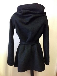 This is a new wool wrap cardigan.Looking fabulous either with the belt,wish is from the same material or without it.It will best fit for size S/M The colour is black .It is 100%wool and is really warm,would recommend dry cleaning for washing it.It does not have lining,it is like a big cosy shawl with sleeves.Has two discret buttons.An outstanding piese of clothing for the upcoming season.SIZE CHARTSIZE S - US 6, UK 8, EU 36bust: bust around 34.5”/90cmWaist: waist around 27.5”/70cmHips: hips arou Wool Wrap Outerwear For Fall, Belted Wrap Outerwear For Fall, Fitted Faux Wrap Winter Outerwear, Oversized Wrap Outerwear For Winter, Fall Belted Wrap Outerwear, Fall Wrap-style Belted Outerwear, Fitted Wrap Winter Outerwear, Fitted Wrap Outerwear For Winter, Shawl With Sleeves