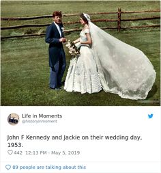 the bride and groom are standing in front of a fence with their wedding dress on