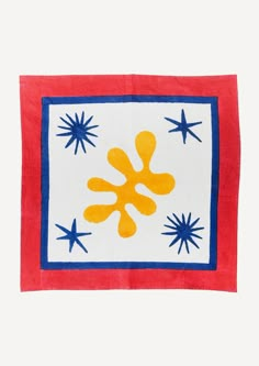 a red, white and blue square with stars on it in the shape of a flower