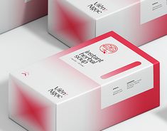 three boxes with red and white designs on them