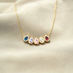 Customizable with each child's birthstone, show your love and your pride of being a mother with this beautiful and meaningful Teardrop Birthstone Necklace. In those tears, an inexplicable connection is found and a bond forged forever. They are tears of pure joy. Luxury Birthstone Jewelry For Proposal, Being A Mother, Heart Flutter, Mother Jewelry, Personalized Gifts For Mom, Necklace Craft, Mom And Grandma, Tears Of Joy, Pure Joy