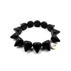 Elegant + edgy = Rock Star Bracelet. This bracelet is such a fun addition to spice up any look! Features: Various Style Stylish and Smooth Comfortable Wearing Experience Fashionable Design Spiked Howlite Stones Elegant Edgy, Rock Chick, Howlite Stone, Star Bracelet, Stackable Bracelets, Rock Star, Inspired By Nature, Quartz Stone, Bracelet Stack