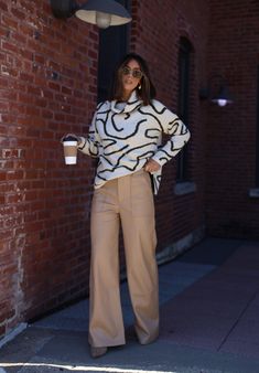 Our Oversized Abstract Sweater is the perfect blend of comfort and style. Crafted with a soft, stretchy knit and an abstract, patterned finish, this turtleneck sweater is not only unique, but provides a relaxed fit perfect for any brunch date, dinner out, or drinks with your closest friends. Trendy, versatile, and chic, you can dress it up or down, for a work look or for a casual outing. This sweater also makes a great statement piece for any wardrobe. Fabric 77% Acrylic, 22% Polyester, 4% Spand Trendy Oversized Spring Turtleneck, Trendy Oversized Turtleneck With High Neck, Trendy Oversized Knit Turtleneck, Trendy Oversized High Neck Turtleneck, Casual Funnel Neck Turtleneck For Work, Casual Knit Turtleneck For Work, Chic Knit Turtleneck For Spring, Chic Spring Knit Turtleneck, Trendy Soft Knit Turtleneck