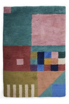 an area rug with various colored squares on it