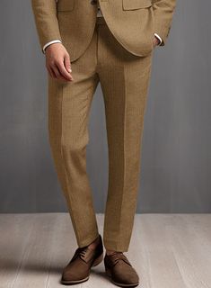 Looking good and smart in the summer is chic – you just have to find your perfect linen suit and flaunt a casual business look. And you need some extra freshness, so take a look at our Sepia Brown Pure Linen Suit. Crafted from linen in 40s Lea, the suit is very durable, strong, and comfortable. Our linen suit would be the first choice, adding some extra freshness to your summer collections.  Look Includes  Sepia Brown Pure Linen Fabric  Two Button Jacket Style  Notch Lapel  Horn Brown Buttons  Single Vent  Three Cuff Buttons  Two Welted Back Pockets on Trousers   Click 'Customize Now' to modify the look if needed.   Lining: Viscose; Dry Clean. Brown Linen Business Suits, Classic Brown Linen Bottoms, Brown Suits With Hidden Button Closure, Tailored Brown Suits With Hidden Button Closure, Brown Double-breasted Suit With Pockets, Brown Linen Pants, Linen Suit, Business Look, Jacket Buttons