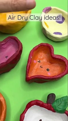 an air dry clay project for kids to make apples, hearts and other fruit shapes