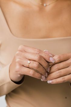 A small, delicate Gold Small Oval Pearl Ring is a delightful, feminine choice. Crafted from eco-friendly recycled gold and a sustainable gemstone, it is the perfect accessory to pair with any Sara Patino Jewelry look. The soft and luminous white pearl offers a timeless beauty that is both classic and modern. Recycled 14k gold filled Mother of Pearl is 6mm x 4mm Everyday 14k Gold Opal Ring, Elegant Everyday Open Moonstone Ring, Elegant Teardrop Opal Ring, Minimalist Solitaire Moonstone Ring, Elegant Everyday Moonstone Ring, Elegant Everyday White Opal Ring, White Elegant Everyday Opal Ring, Everyday Oval Ring With Single Diamond, Minimalist Oval Moonstone Ring For Everyday