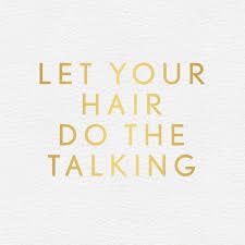 the words let your hair do the talking are written in gold on a pink background