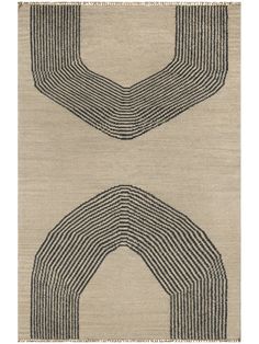 two rugs with black and white lines in the shape of an arch on top of each other