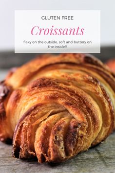 a close up of a croissant on a table with text overlay that reads gluten free croissants