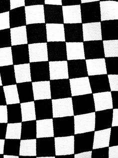 a black and white checkered blanket is shown