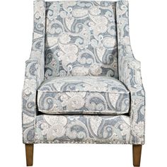 an upholstered chair with paisley print on the back and arms, against a white background