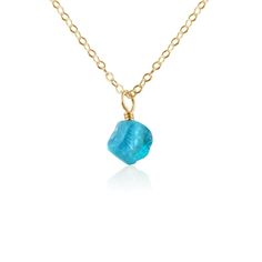 Immerse yourself in the calming energy of our Tiny Raw Apatite Crystal Pendant Necklace. Raw crystals are the most untouched and natural form of crystals, looking and feeling exactly as nature intended. This small, lightweight pendant is handcrafted with a genuine, unpolished apatite gemstone, showcasing serene blue hues. The raw energy from the gemstone connects you to Mother Nature, promoting clarity and inspiration. Perfect for those who cherish the raw beauty and uplifting properties of apat Apatite Jewelry, Apatite Crystal, Raw Crystals, Precious Gemstones Jewelry, Bronze Jewelry, Crystal Pendant Necklace, Natural Form, Jewelry Care Instructions, Gemstone Jewelry Handmade